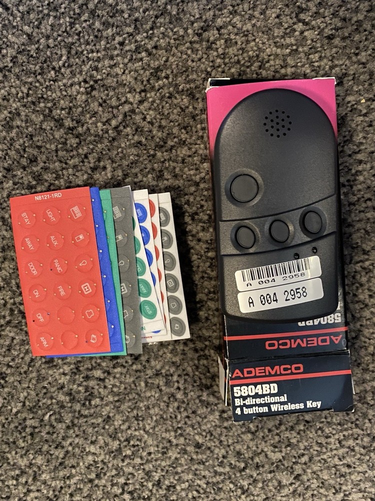 5804BD BI-DIRECTIONAL 4 BUTTON WIRELESS KEY ..open box