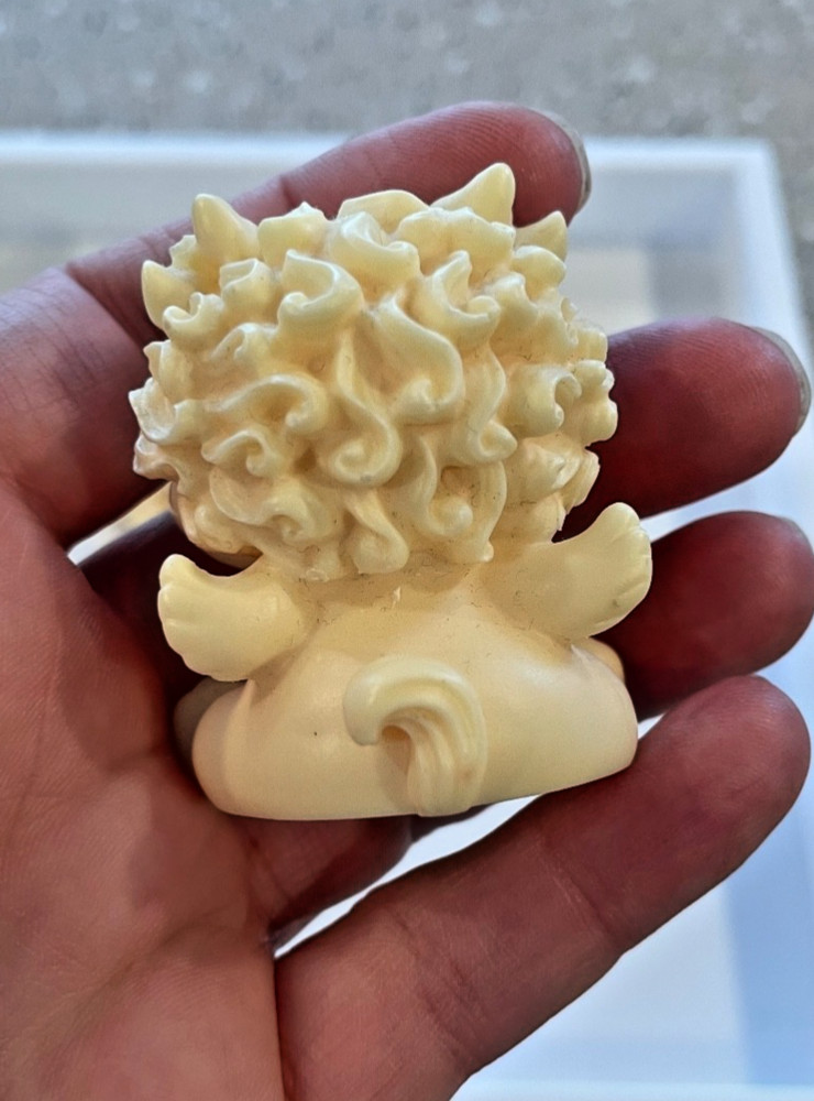 Ivory nut money animal (pair)