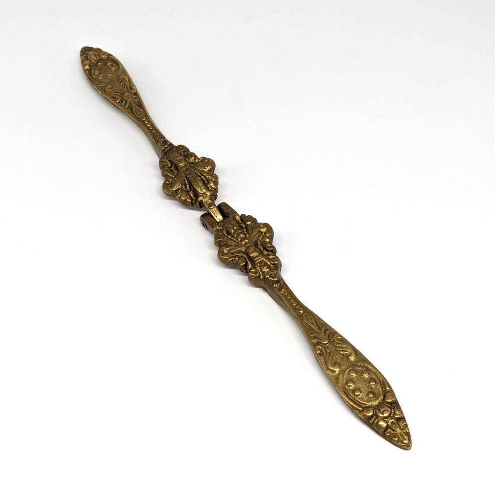 Brass Nutcracker Fleur de Lys Embossed Ornate Cast Floral Hollywood Regency