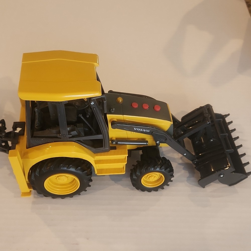 Volvo BL71 Backhoe Loader Plastic Toy Model Yellow Black