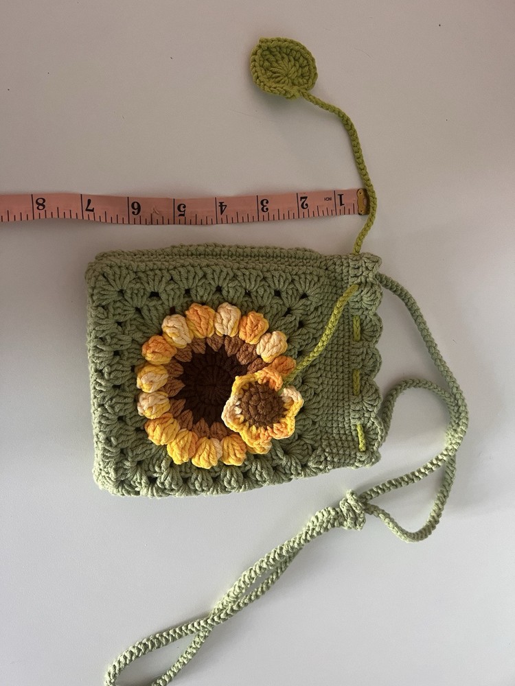 handmade crochet green pouch with sunflower