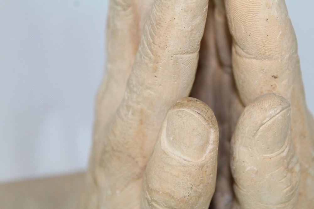Plaster bookends Reading Hands
