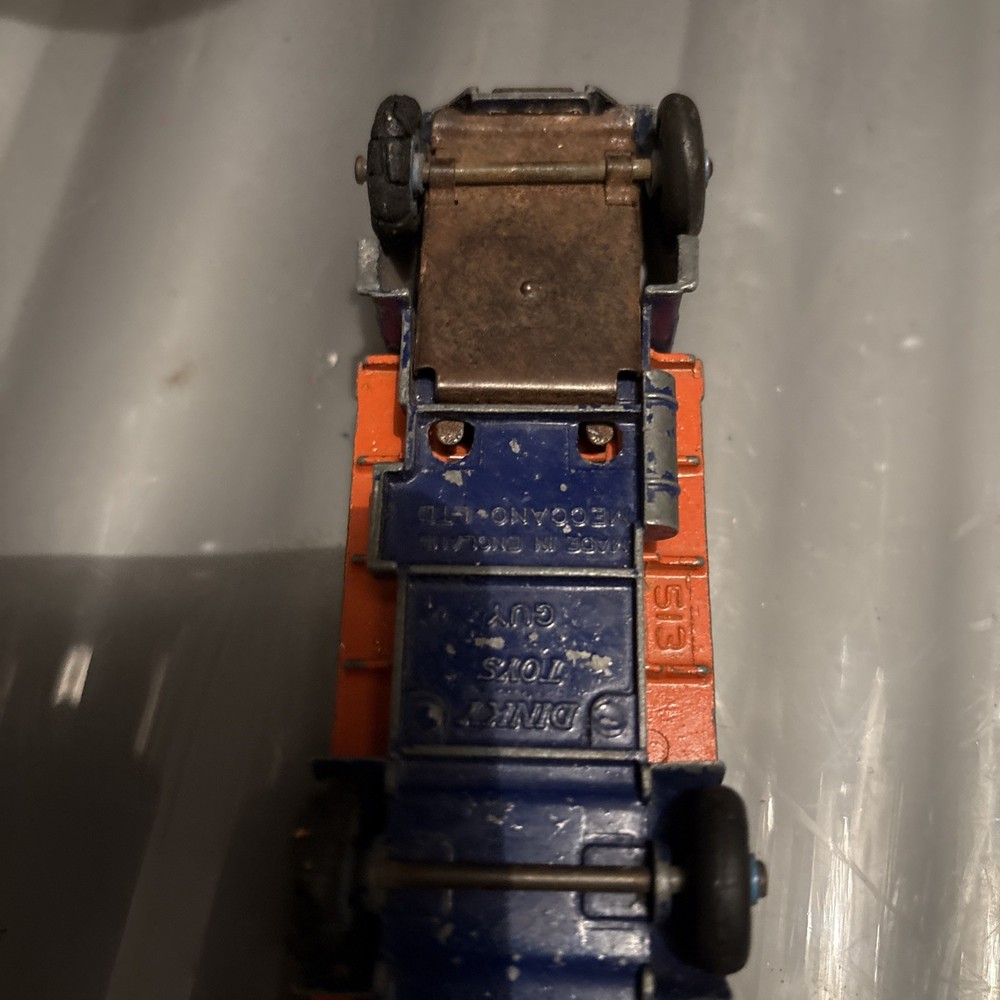 DINKY GUY FLATBED with tailboard 1950s. orange & blue