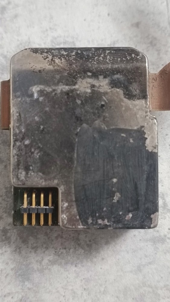 Flexible printed circuit board with integrated sealed electronic module.