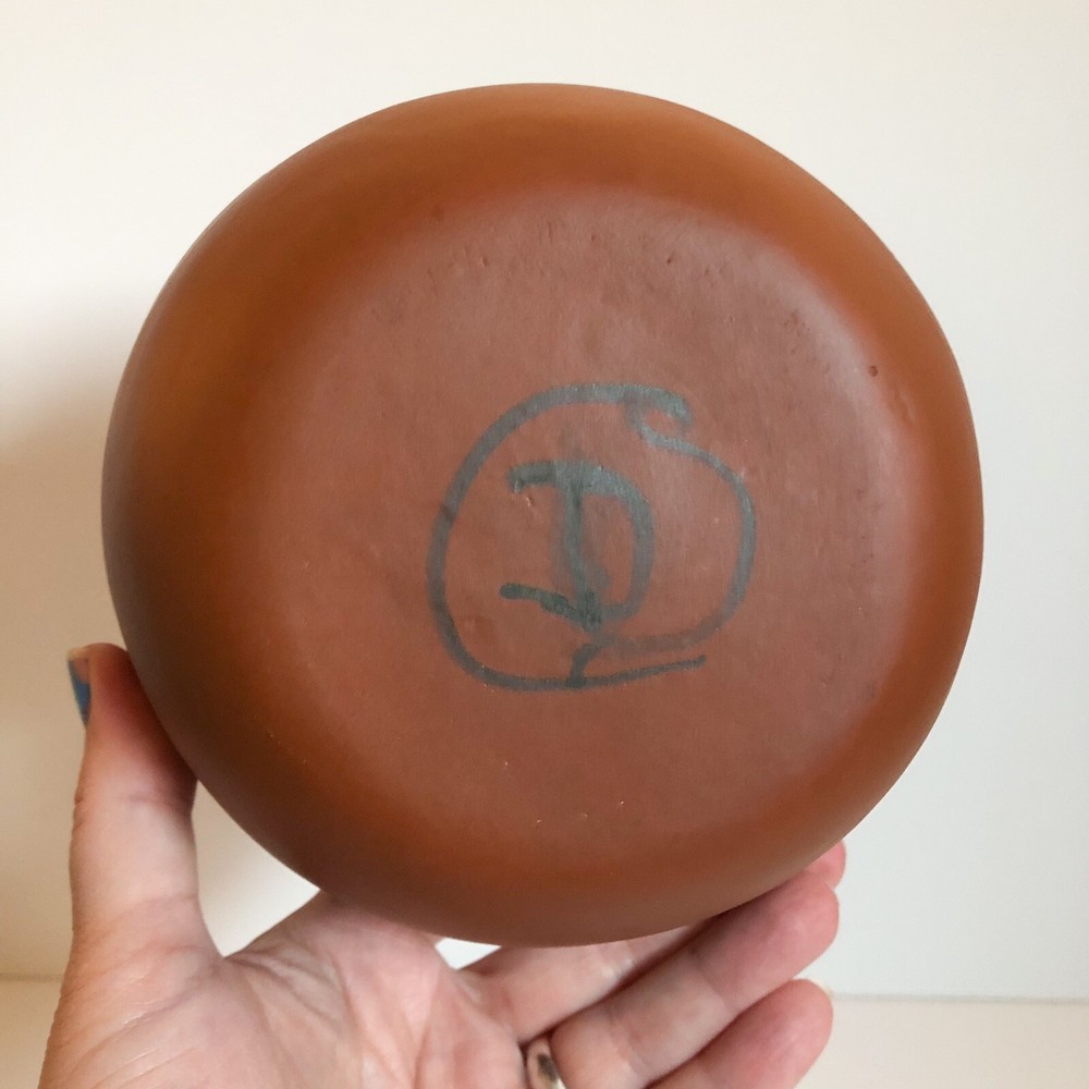 Signed Capuchin style bowl w/ glossy floral interior