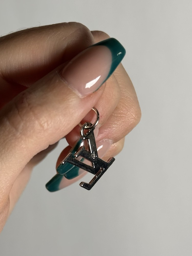 LOUIS VUITTON Silver Logo Metal Zipper Pull Charm