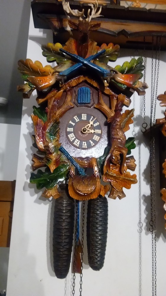 Blackforest Blue Guns Cuckoo Clock Eight Day.