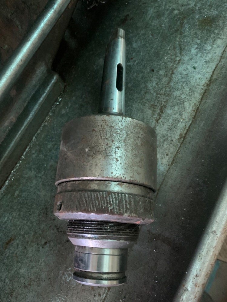 self reversing tapping head