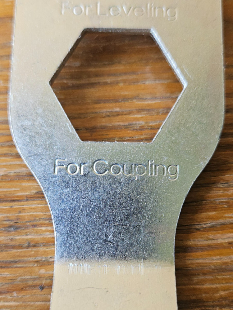 LEVELING, COUPLING, SHIPPING METAL MULTI TOOL.