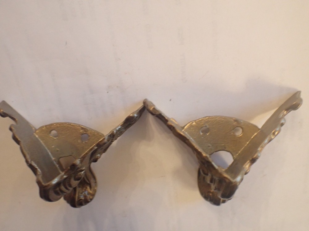 TWO FRONT FEET FOR BLACK MANTEL CLOCK