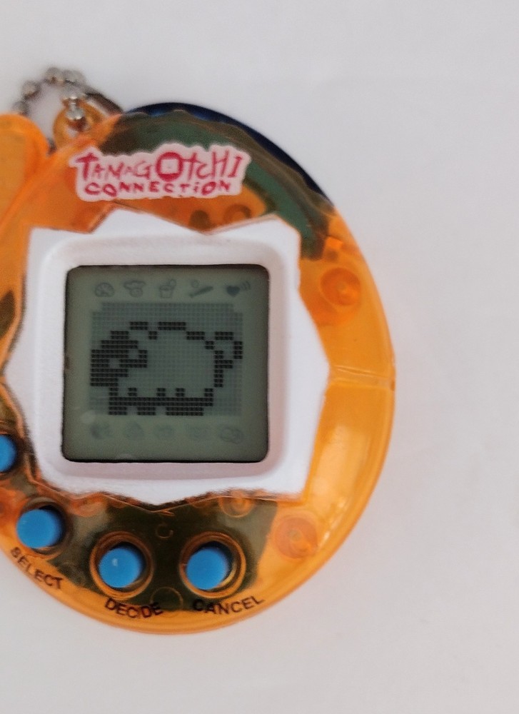 Tamagotchi Connection orange clear/transparent Tested Works