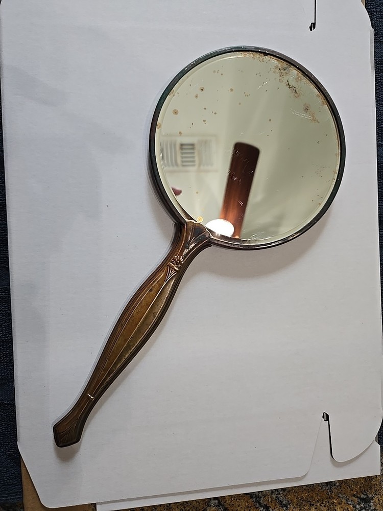 vintage hand-held vanity mirror