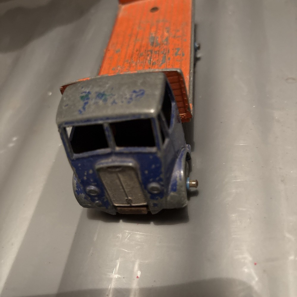 DINKY GUY FLATBED with tailboard 1950s. orange & blue