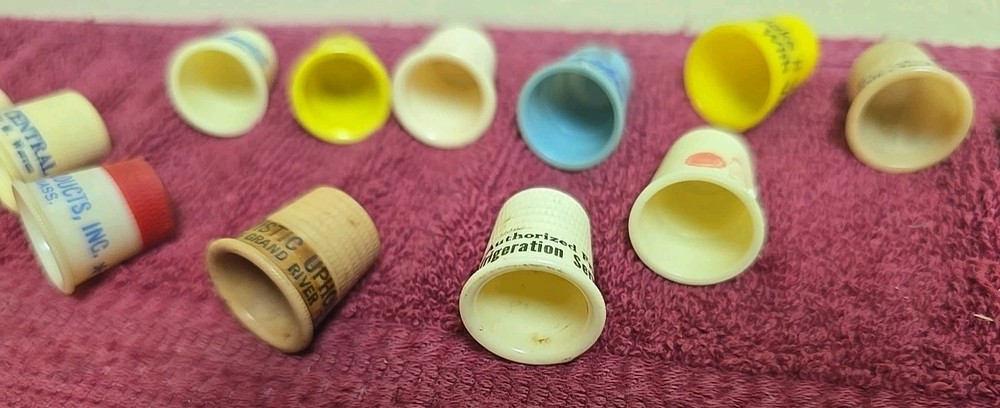 17 Plastic Thimbles 15 Have Advertising On Them