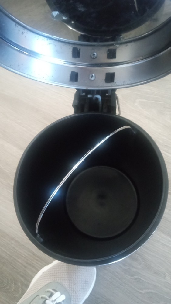 Small gray trash can