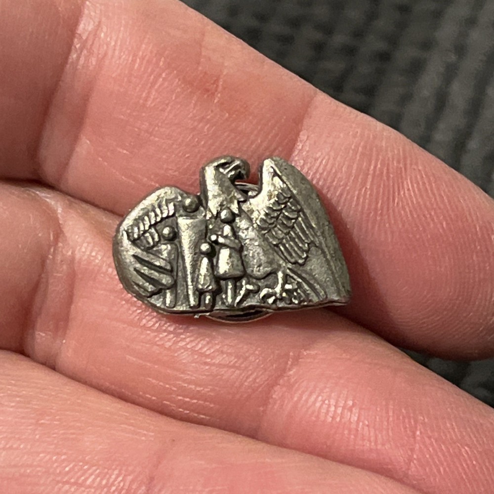 Pewter Eagle People under wing lapel pin 58