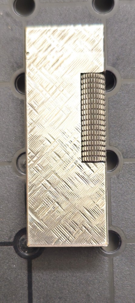 Dunhill Popular models roller gas lighter Made in Switzerland. Untested.