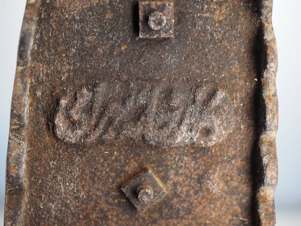 Antique cast iron coal fired clothing iron