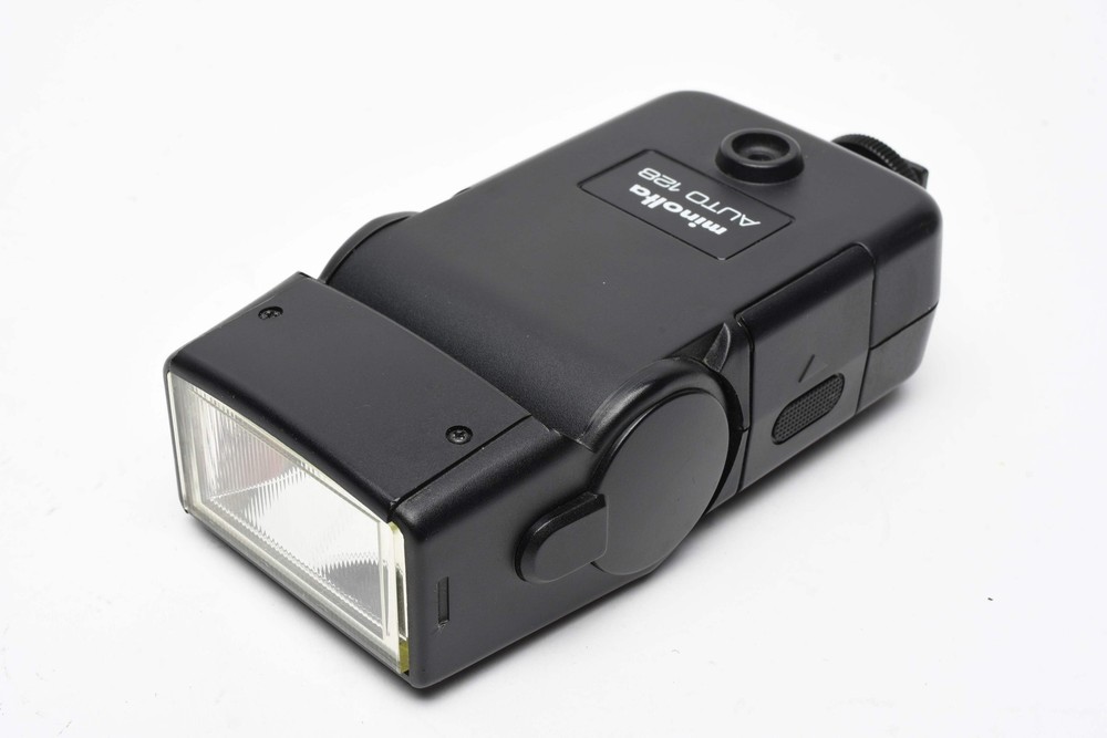 Minolta Auto 128 electronic flash, nice & clean, tested, w/Case+Manual+Diffuser