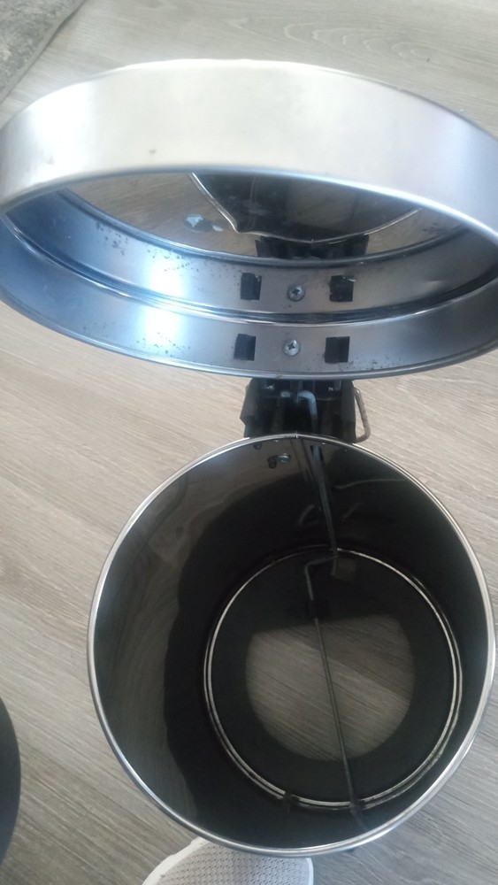 Small gray trash can