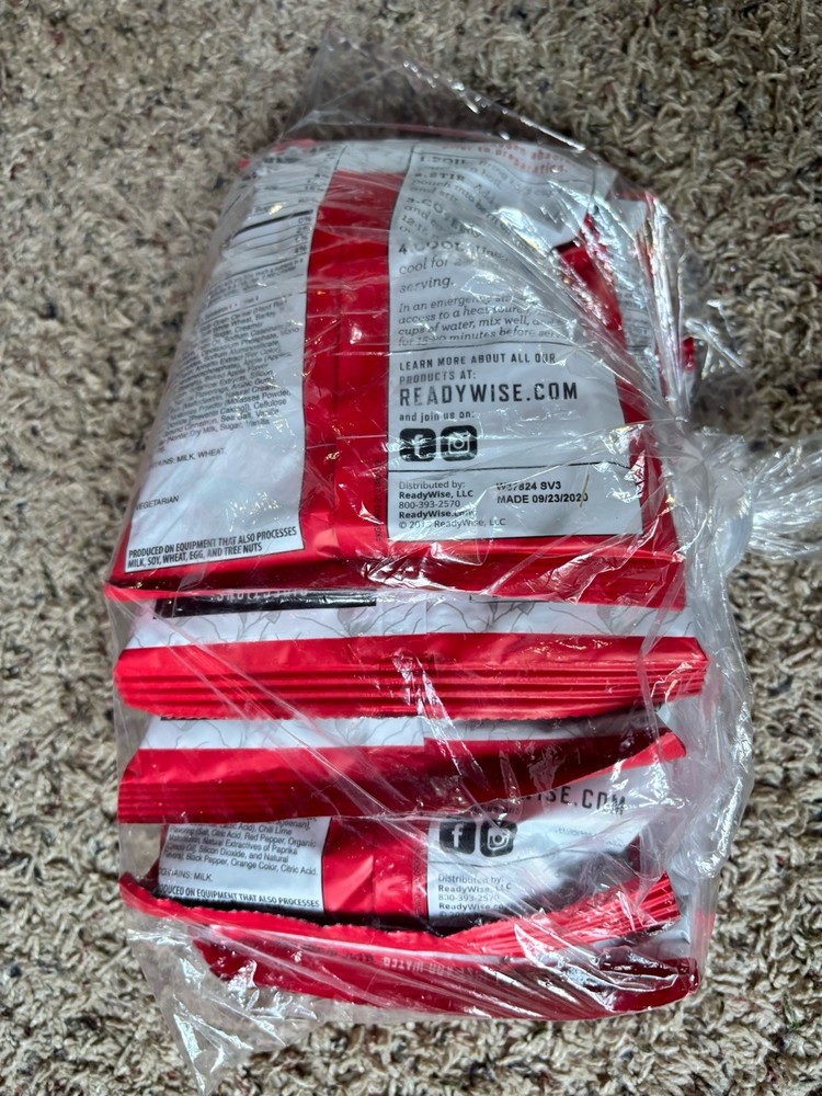 ReadyWise Red White Emergency Survival Backpack (64 piece) open box