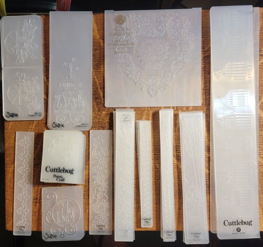 Choose from 40 odd-sized Griffin, Cuttlebug, Sizzix, Darice embossing folders