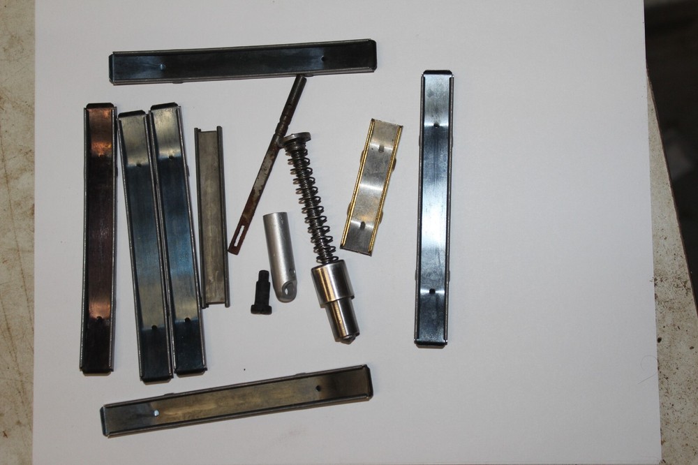 Misc stripper clips and gun parts U1