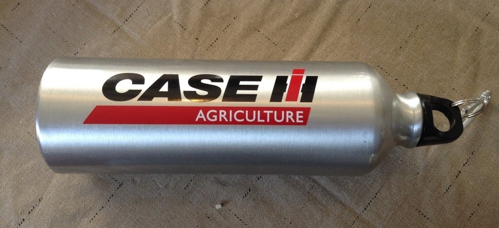 A New CaseIH Liquid Container for Coffee or Other drinks, Has Screw on Lid