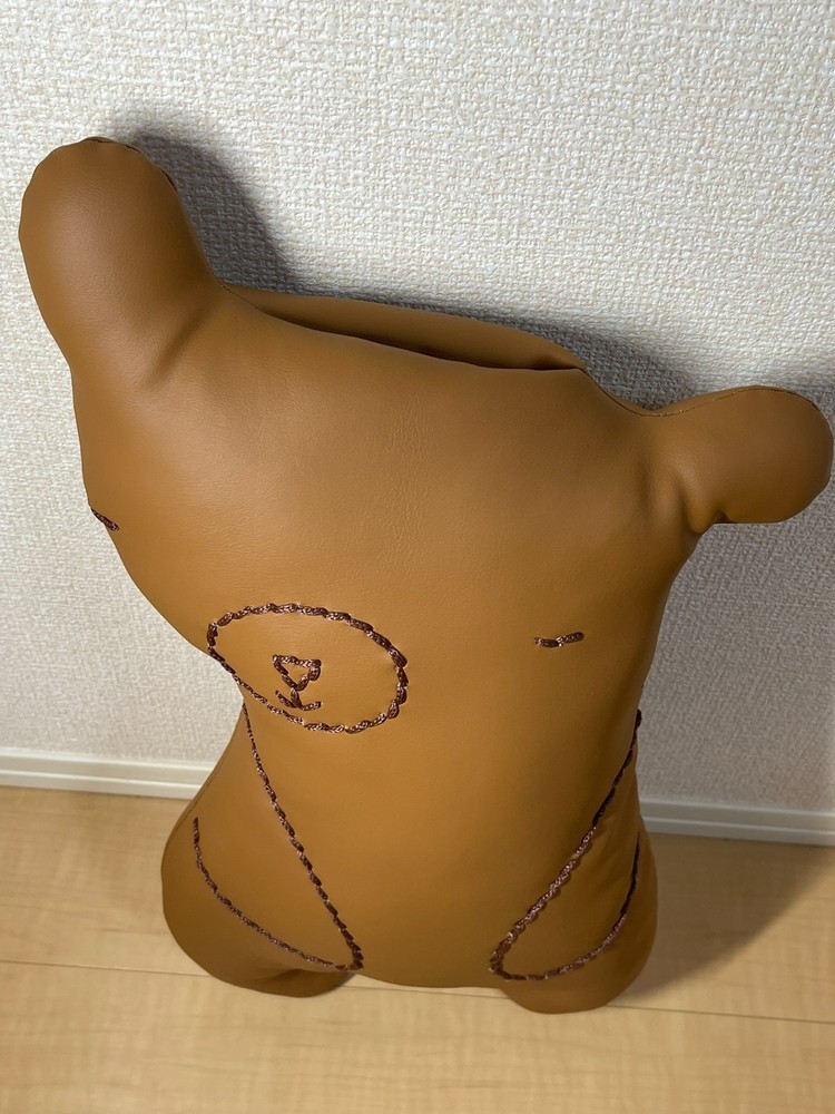 Handcrafted leather teddy bear that can chat in several languages