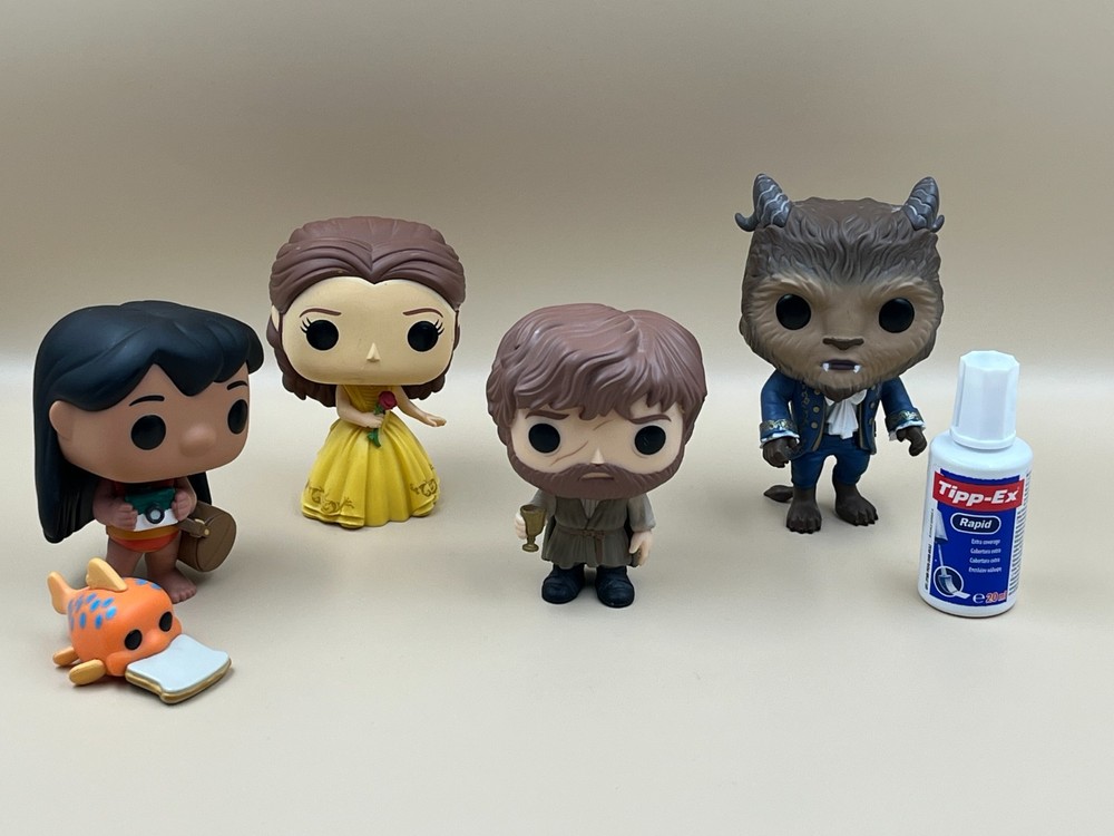Four Funko Pop Vinyl Figures.