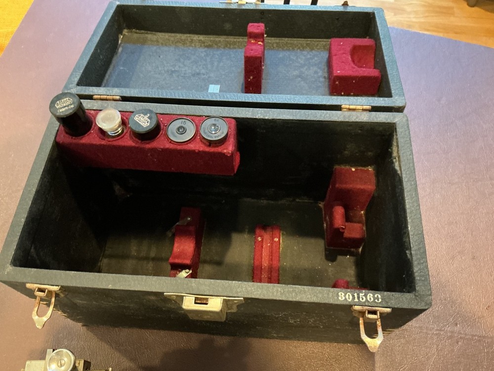 ERNST LEITZ MICROSCOPE WITH 3 OBJECTIVES AND CASE.