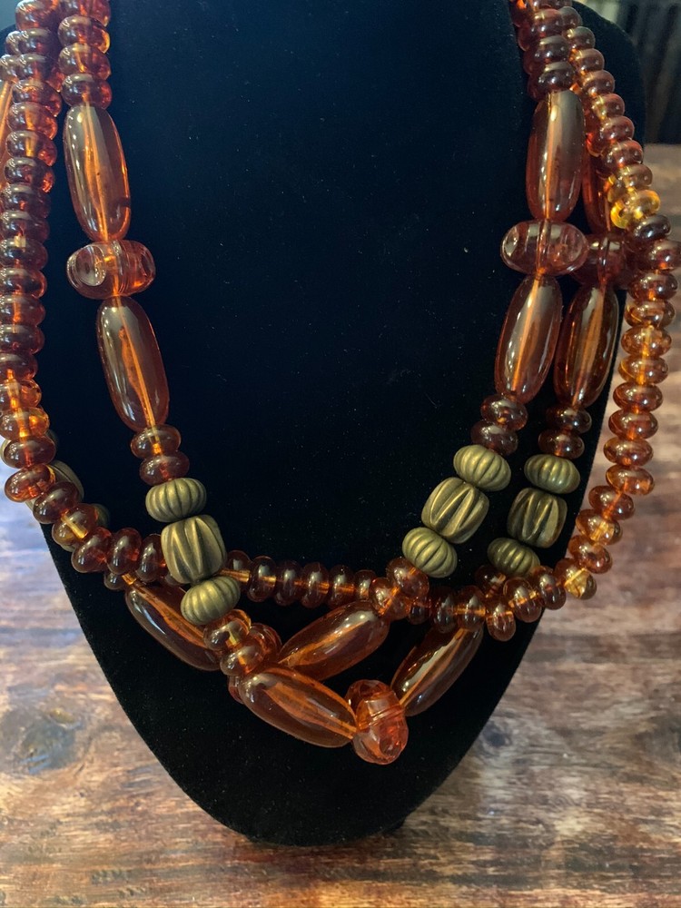 Vintage multi-stranded plastic beaded necklace. 18"