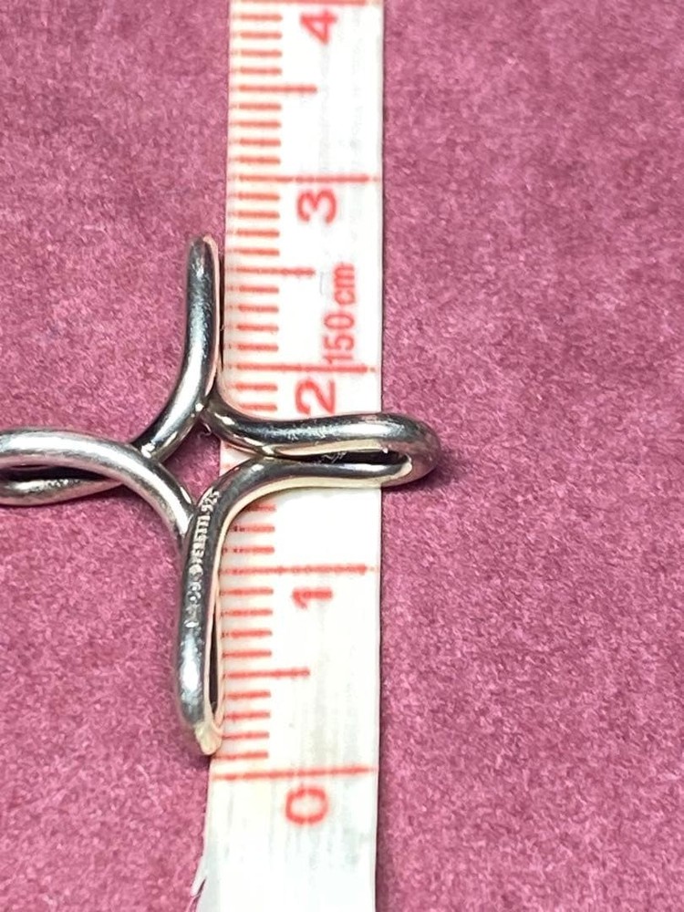 Cross-shaped necklace component, Tiffany & Co. Infinity Cross