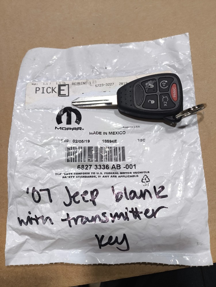 Genuine Mopar Blank With Transmitter Key 68273336AB