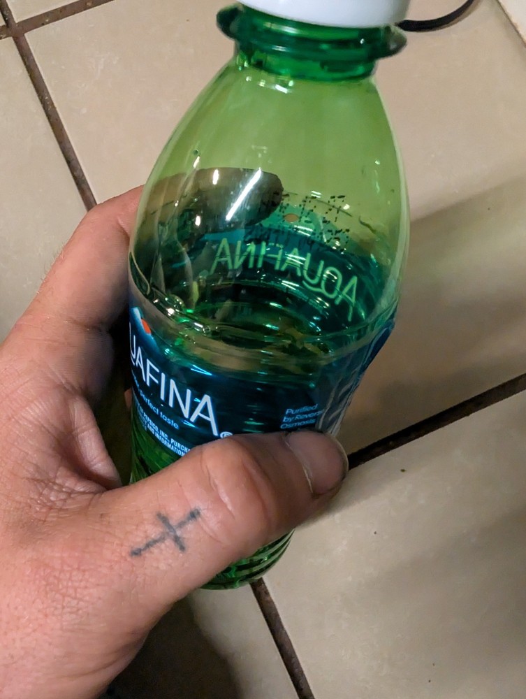 Green Hard Plastic Aquafina Bottle