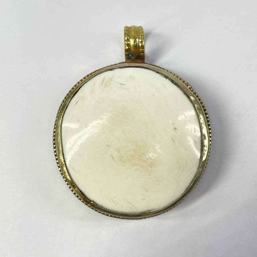 Tibetan Shell Repoussé Pendant