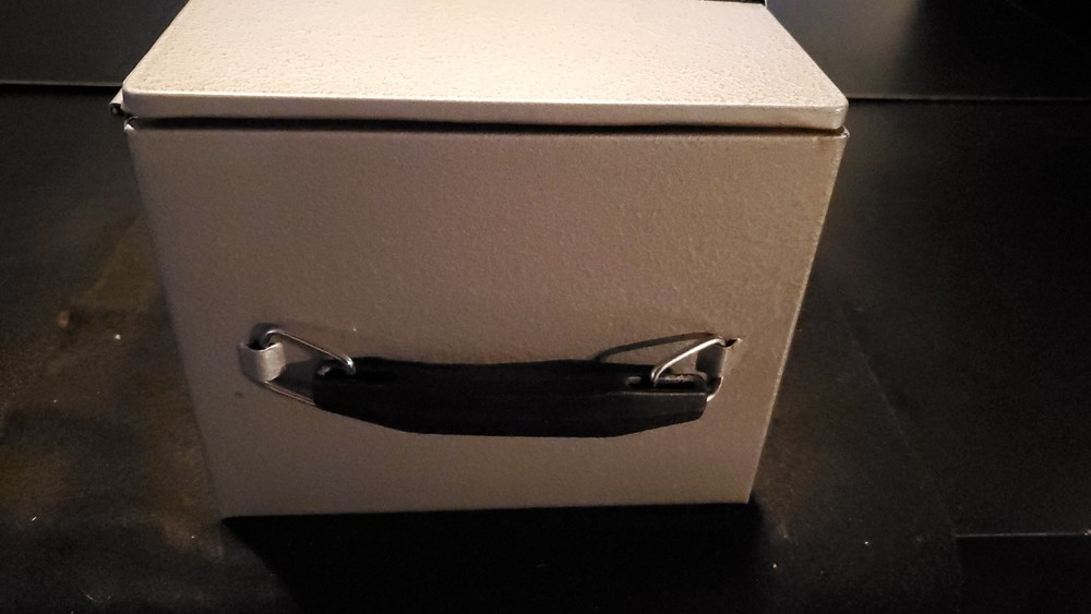 The Protector Fire Safe Grey and Silver New with Key