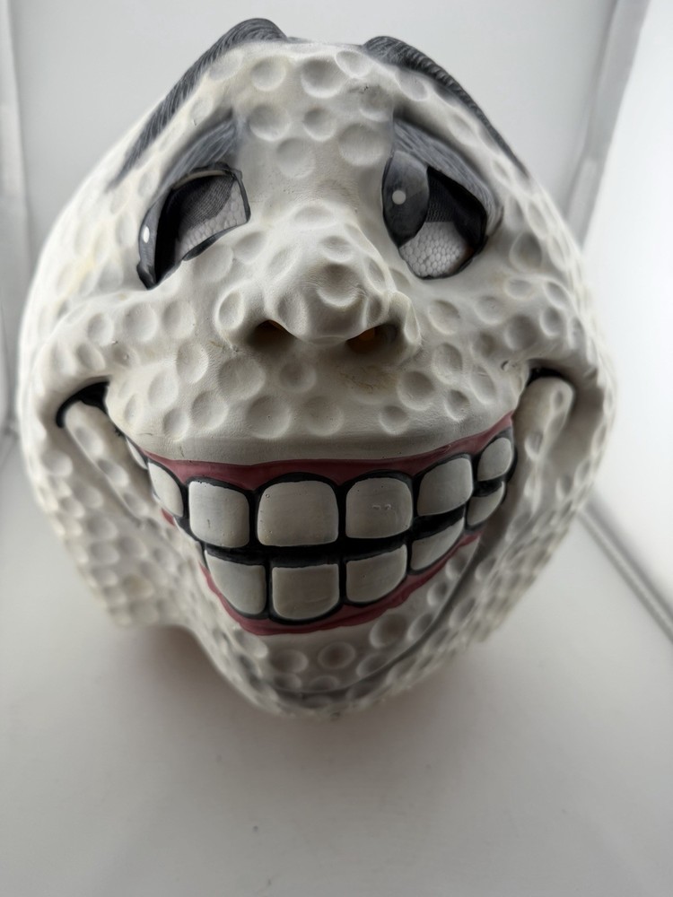 “ Mad Grinning Golf Ball” Produced By Fun World. Textured Surface