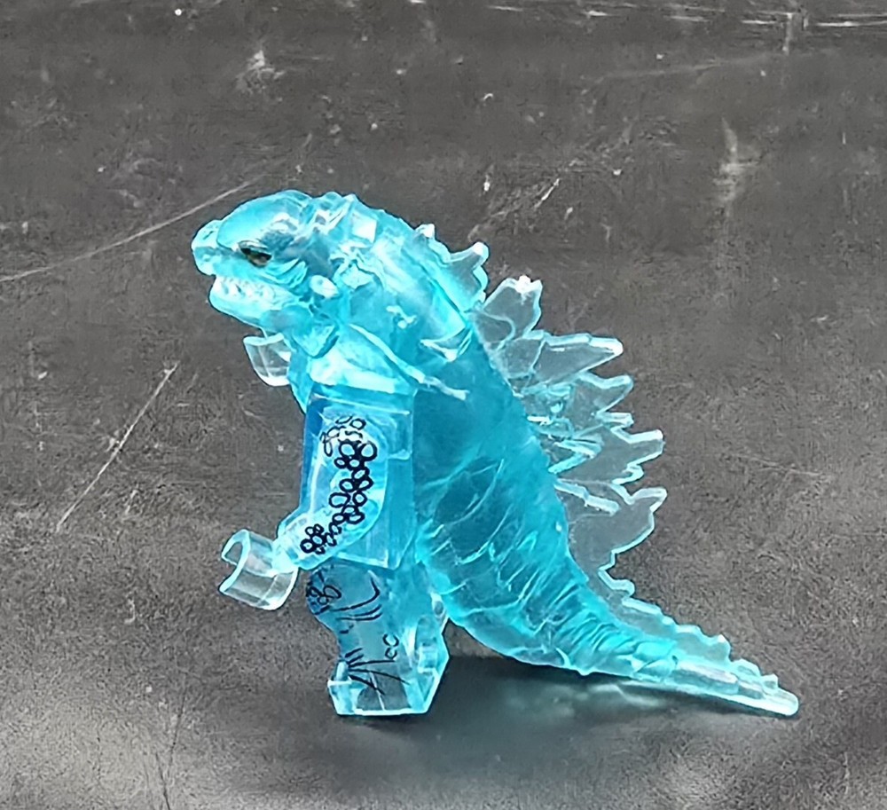 godzilla mini figure- trans neon blue ice with printed body definitions