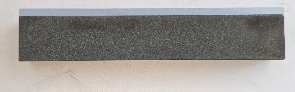Vintage sharpening stone maybe natural stone , used