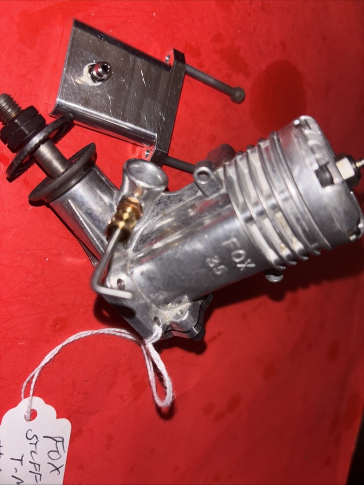 FOX 35 C/L ENGINE Stuffer Backplate COMPLETE WITH TONGUE MUFFLER # 117
