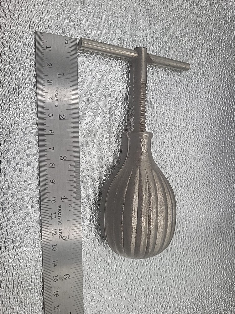 Vintage nut cracker Cast Iron T Handle Screw Shell Design