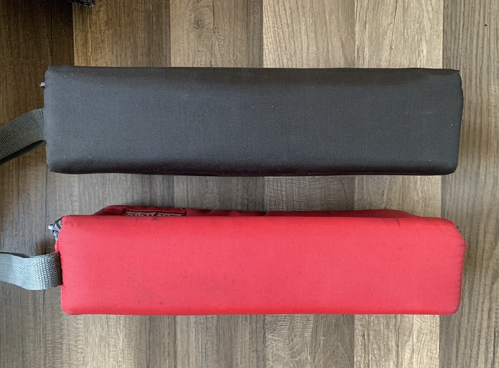 2- Case Logic 15-Cassette Cases (one Red, One Black)