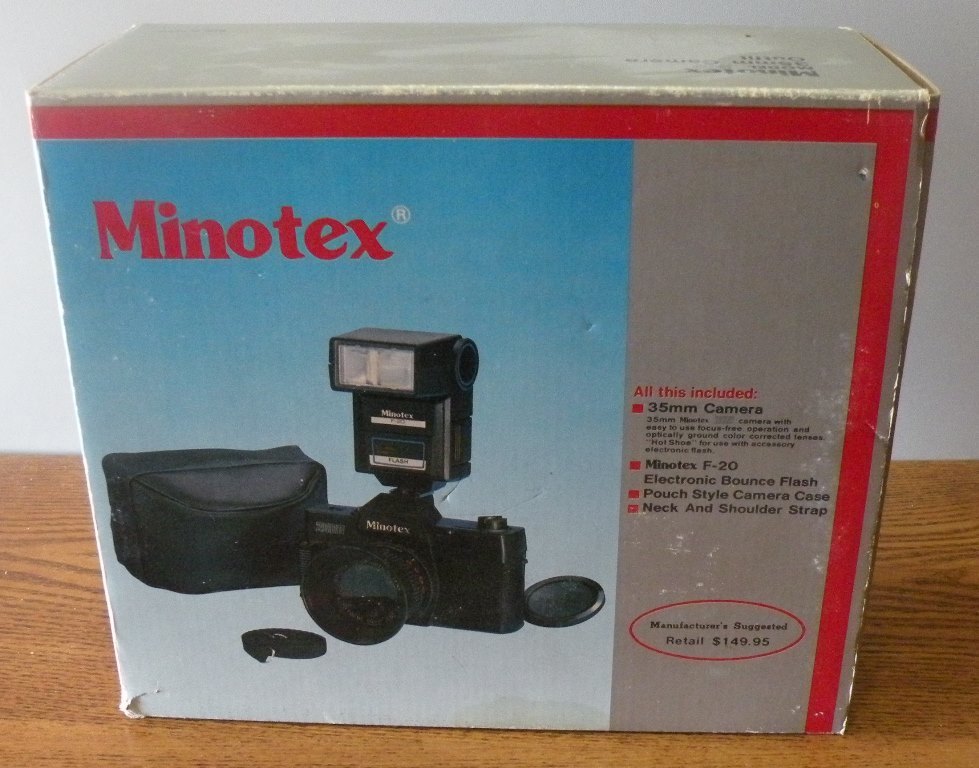 Minotex 2000 35MM camera with flash attachment and case in original box
