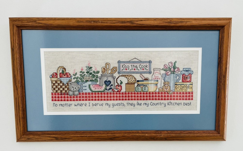 Completed Cross Stitch “Kiss The Cook”