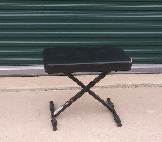 USED BLACK LEATHER  FOLDING  PROLINE WORKOUT BENCH