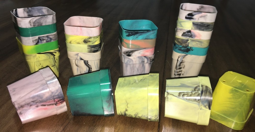 24 mid century seed starter pots 1960-80~marbled plastic multi colored 2"X2"