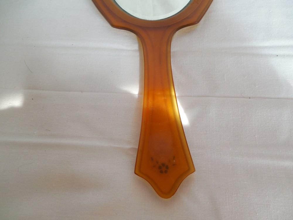 Vintage large bakelite hand mirror