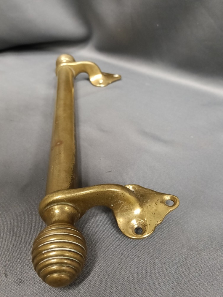 BARE BRASS SASH WINDOW PULL 28 CM IN LENGTH D6