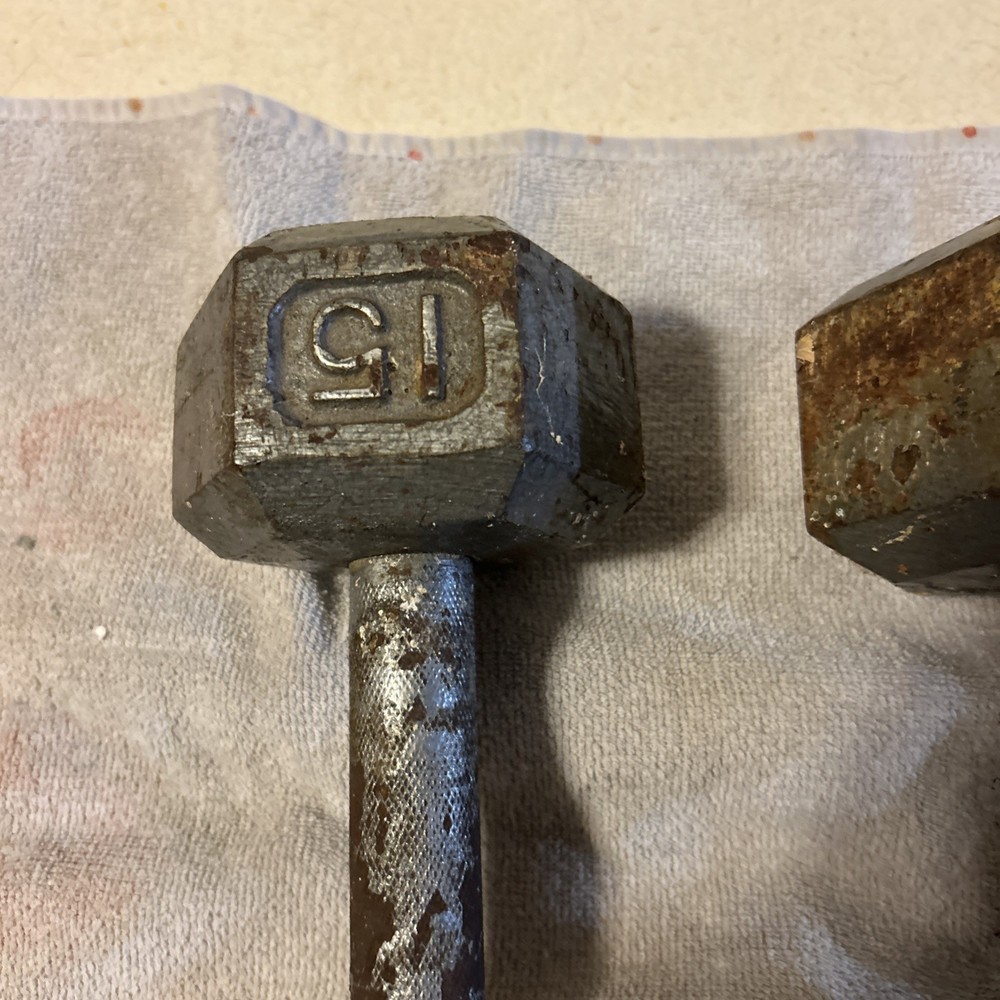 Three 15 Pound hex Head Cast Iron Dumbbells Silver